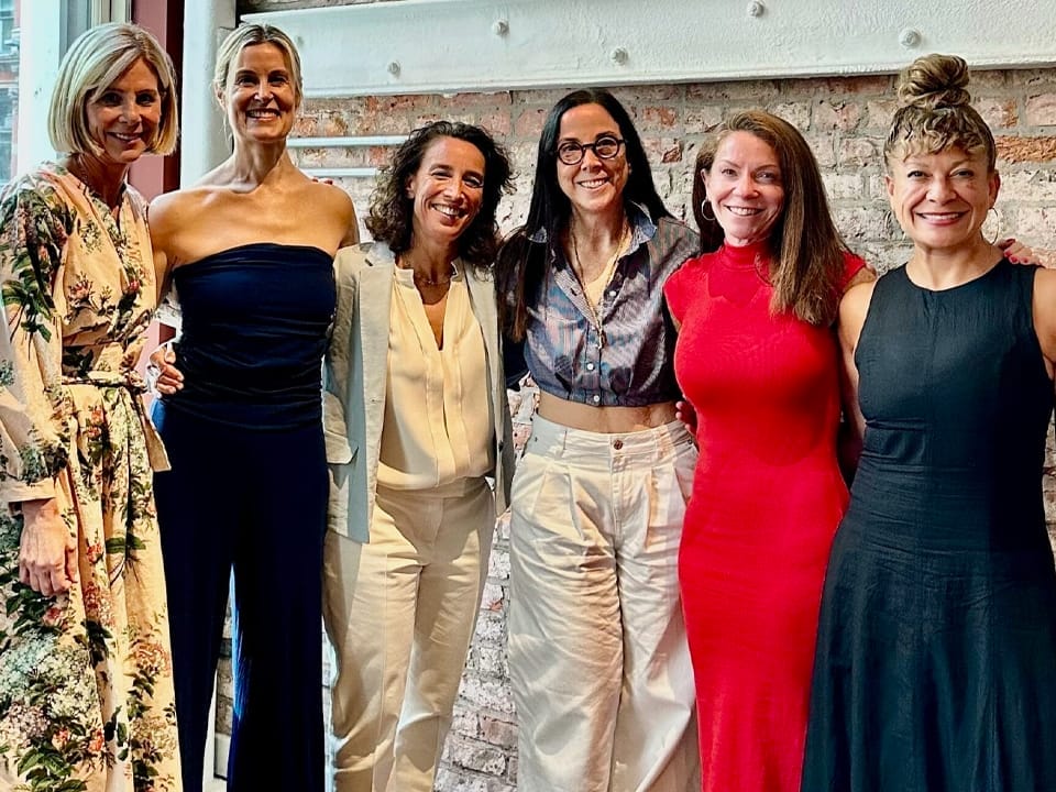 Debra Bednar-Clark with women leaders at professional event